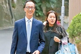  23年婚姻背后：梁锦松与伏明霞的时光故事。